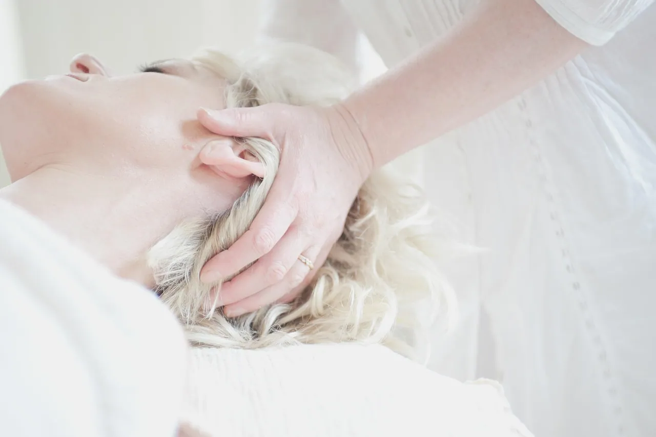 Hands during a gentle hand massage.