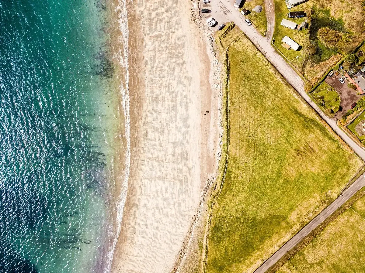 An aerial view of a tropical coastline.