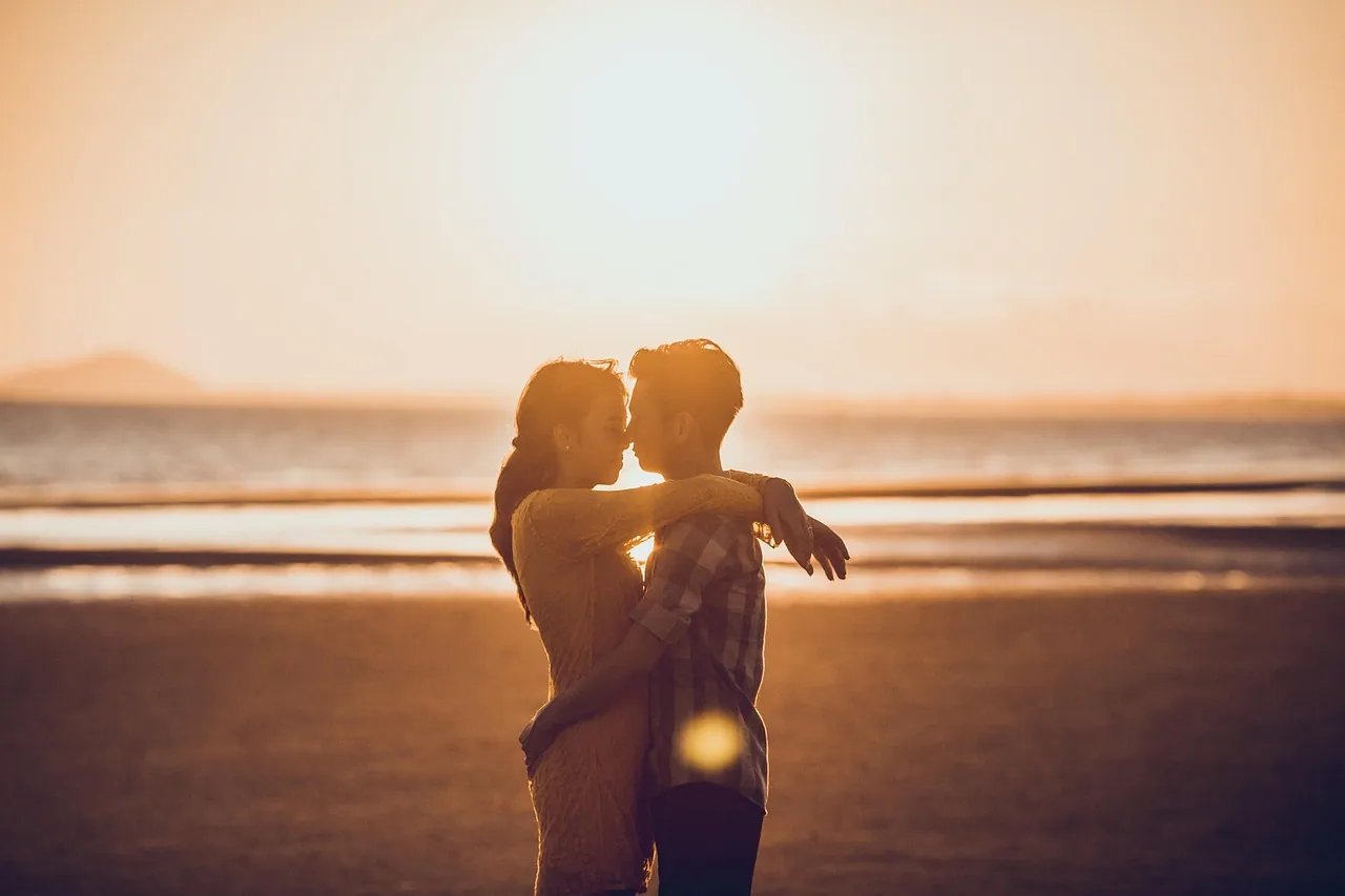 A couple at sunset.